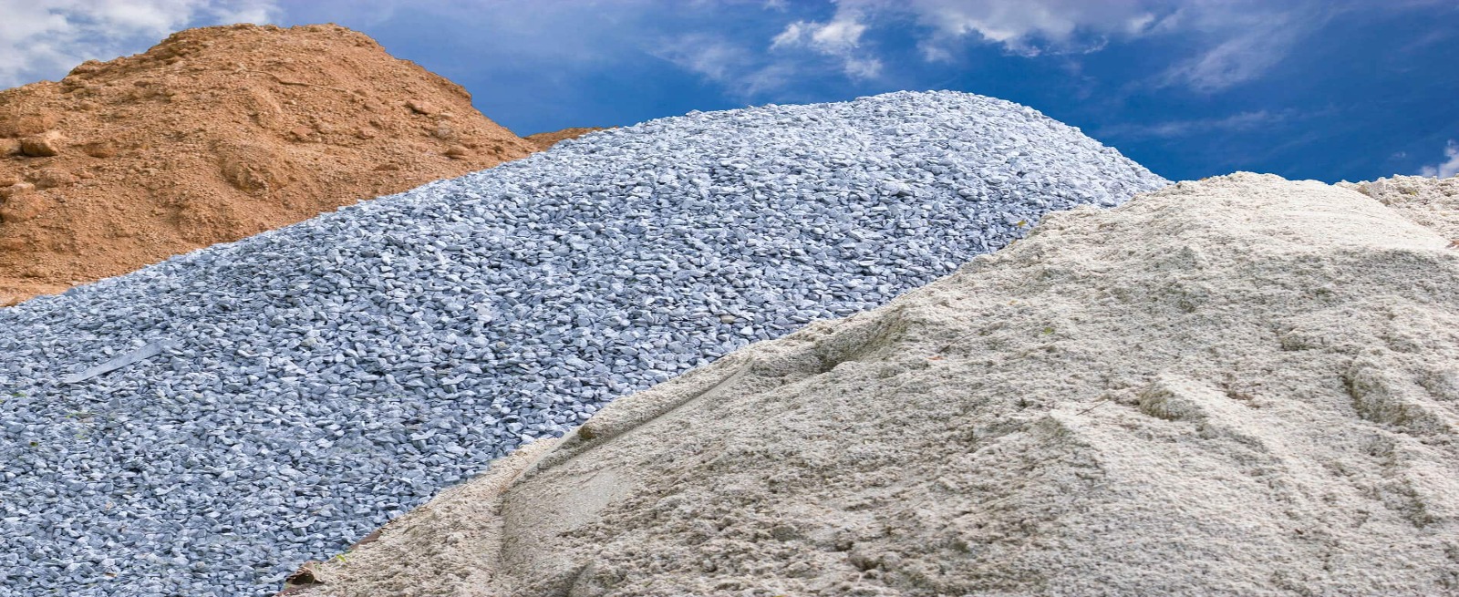 piles of different types of rock.