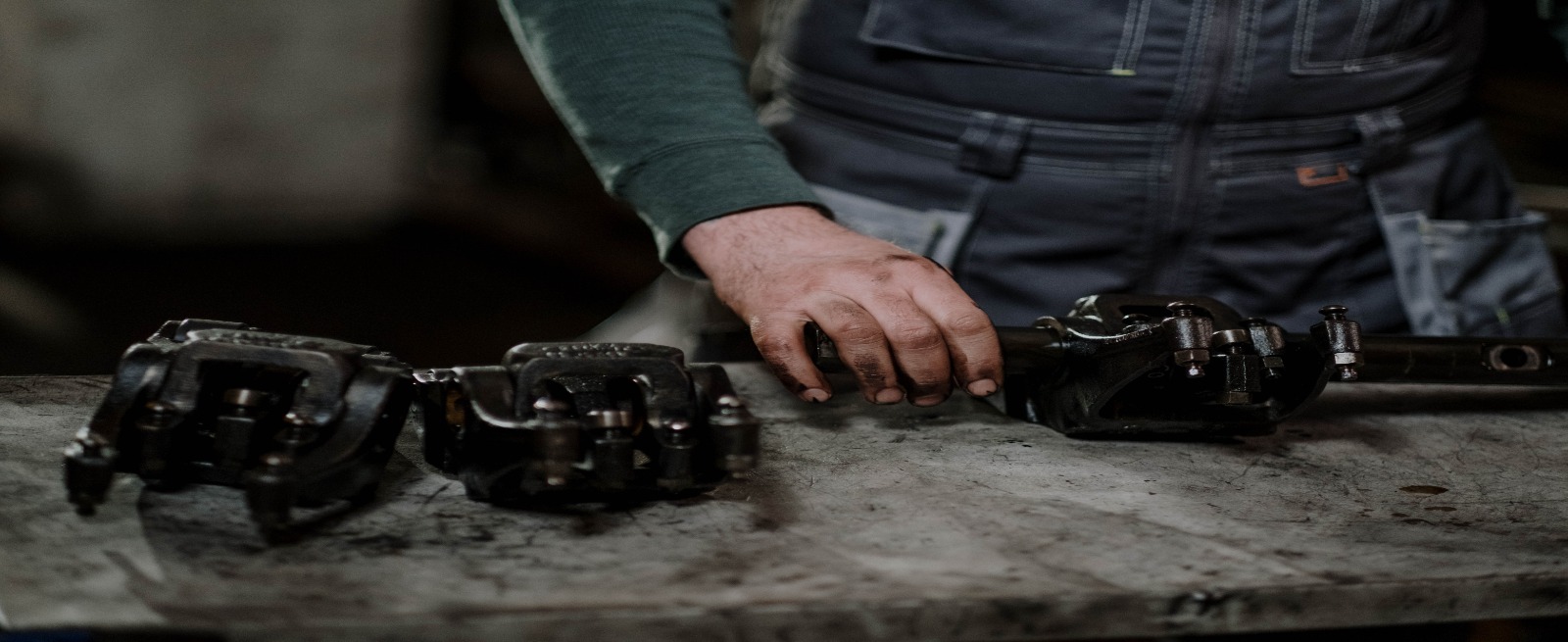 person working on a small engine