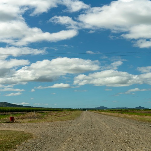 Gravel road with a driveway 