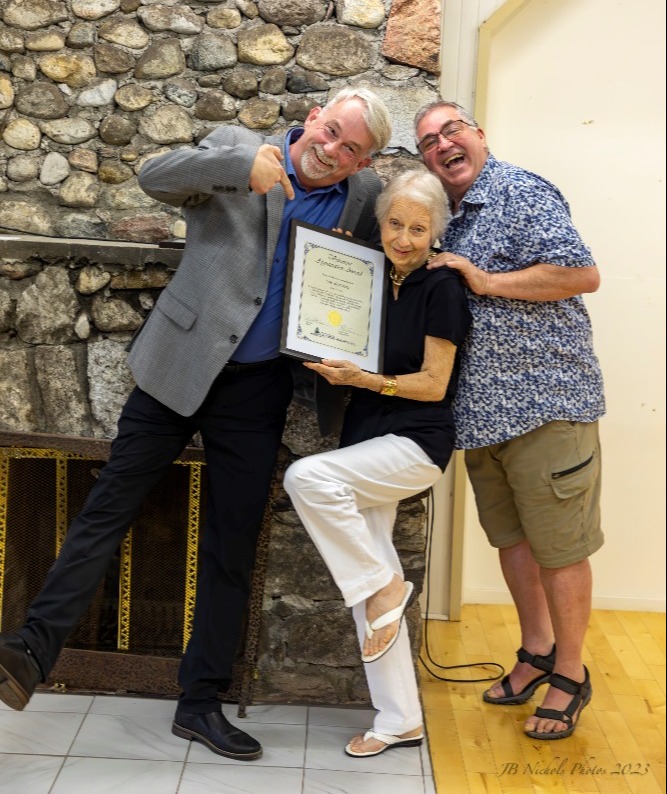 rob and sue and rob holding certificate