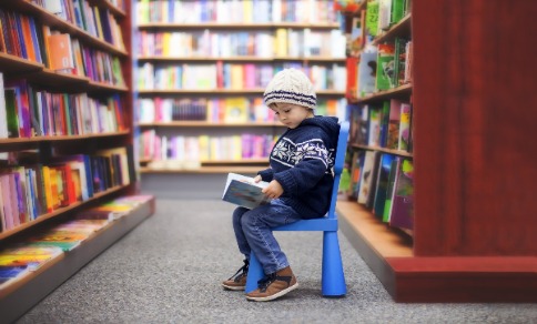 Child reading in a Library