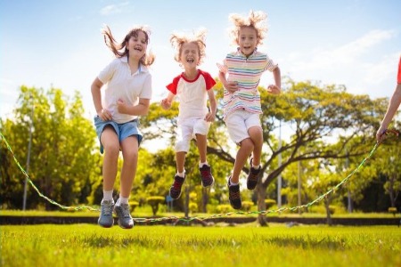 three kids jumping