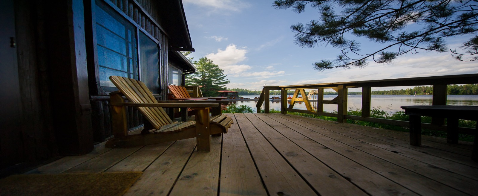 Chairs on the deck overlooking the water