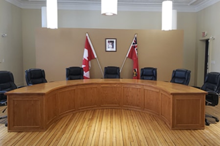 Council room with semi-circular desk and chairs