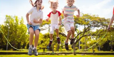 three kids jumping