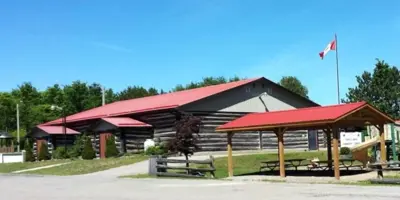 daca centre log building with red roof